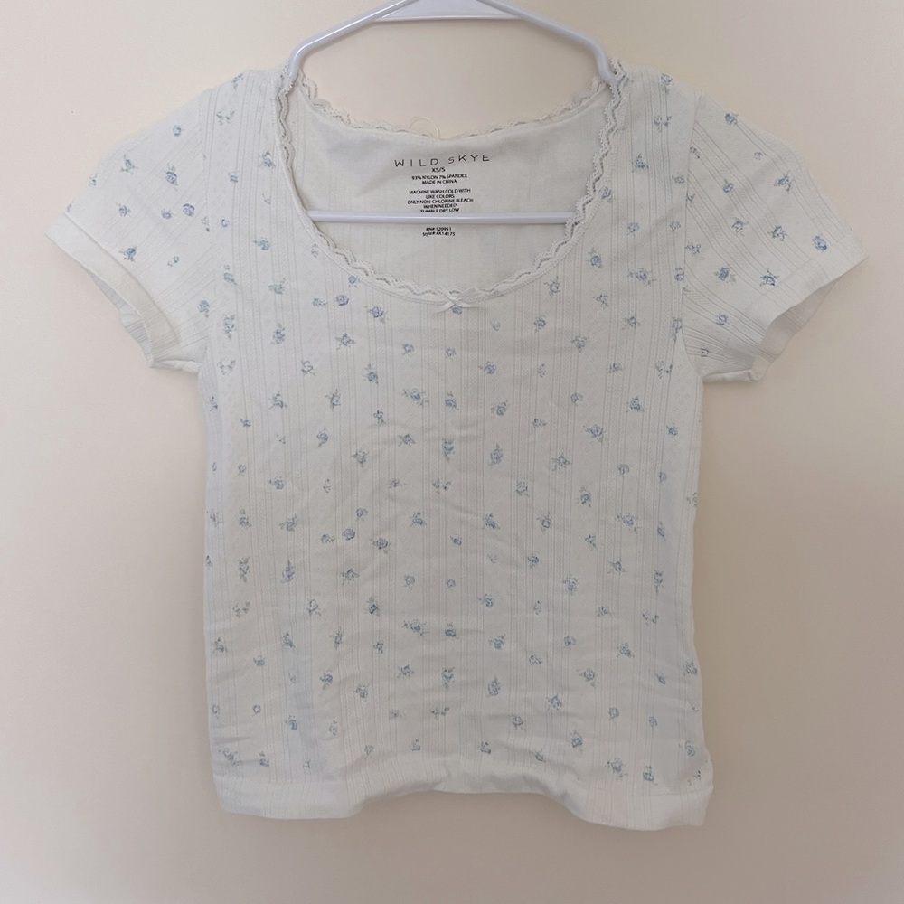 Wild Skye short sleeve textured top. Comes from a smoke free home.